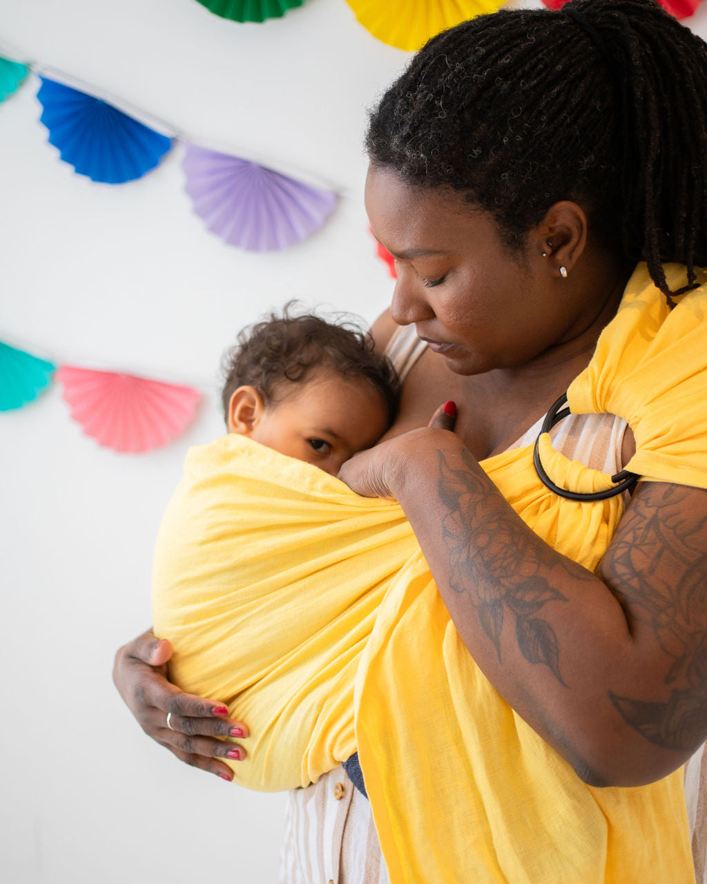 Nursing in Yellow Ring Sling