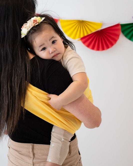 Back View of Toddler Snuggling in Ring Sling