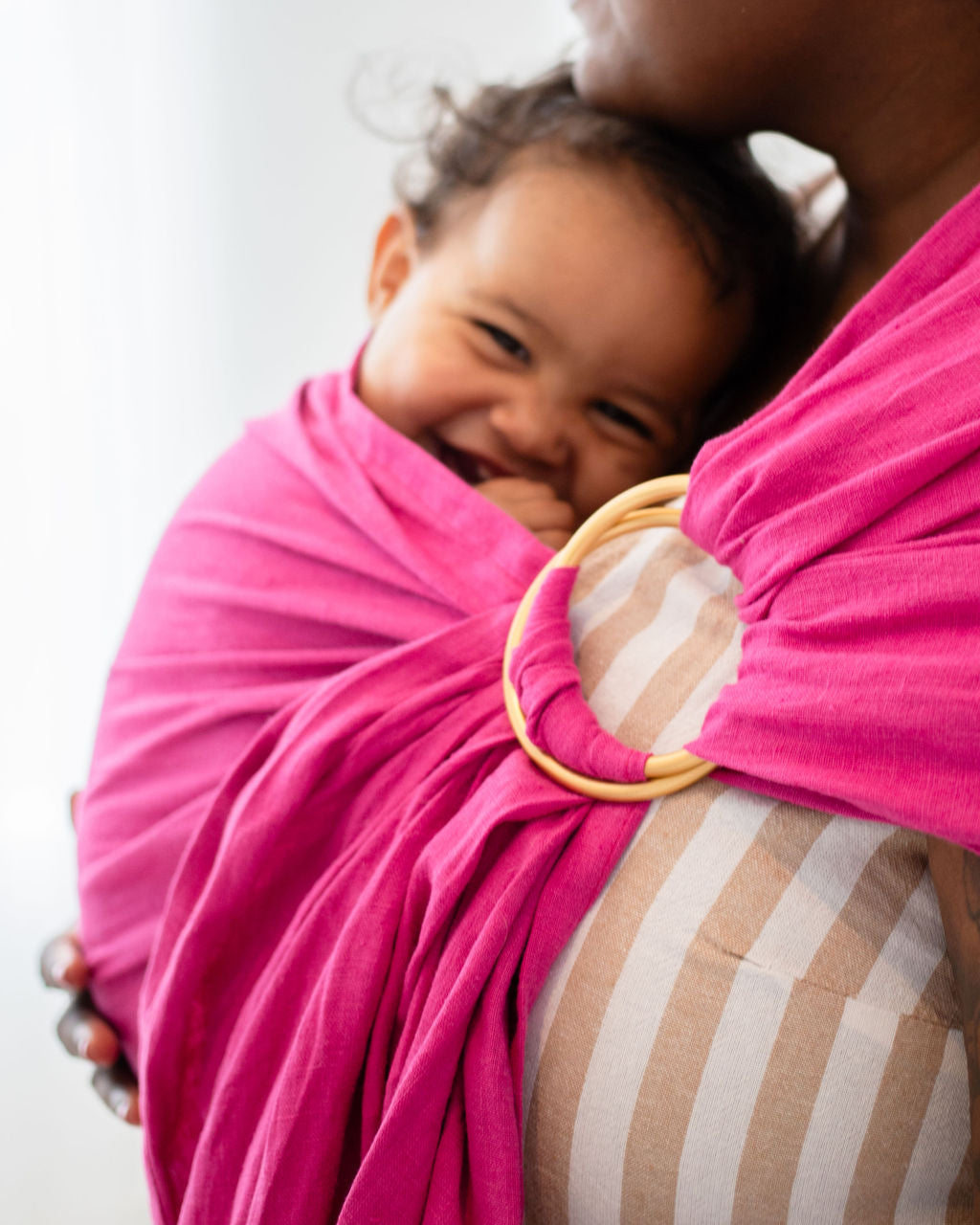 Happy Snuggly Baby in Pink Ring Sling Baby Carrier