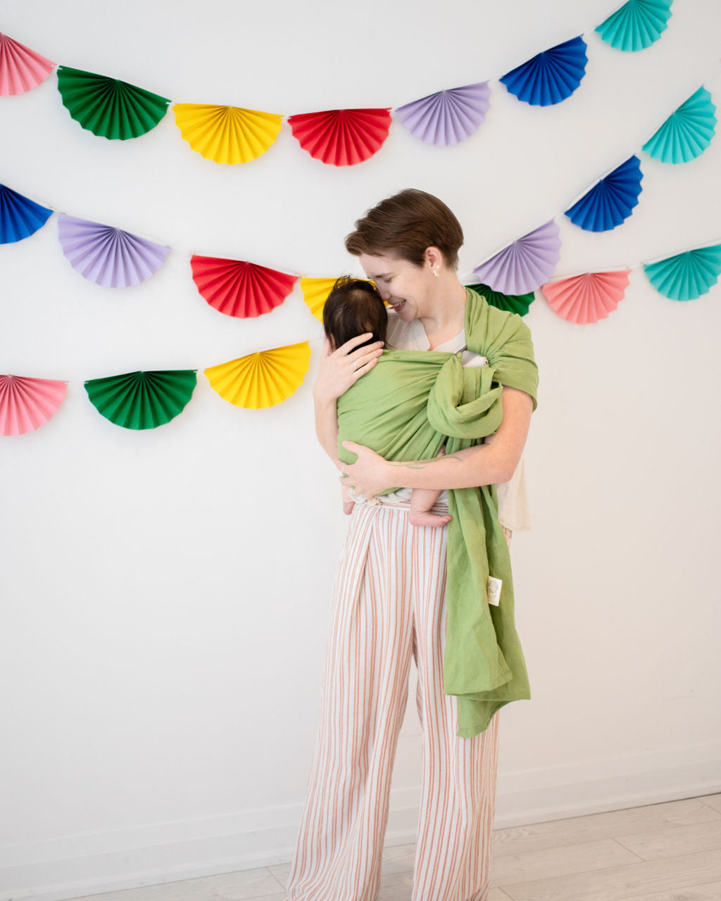 Parent cuddling baby in Linen Ring Sling
