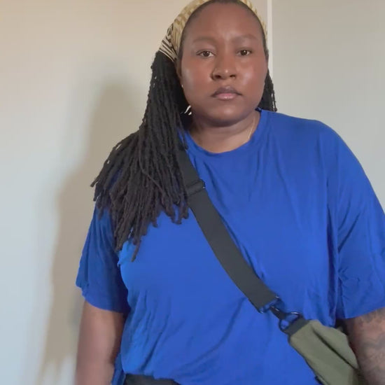 Black Woman wearing Green Linen Crescent Bag