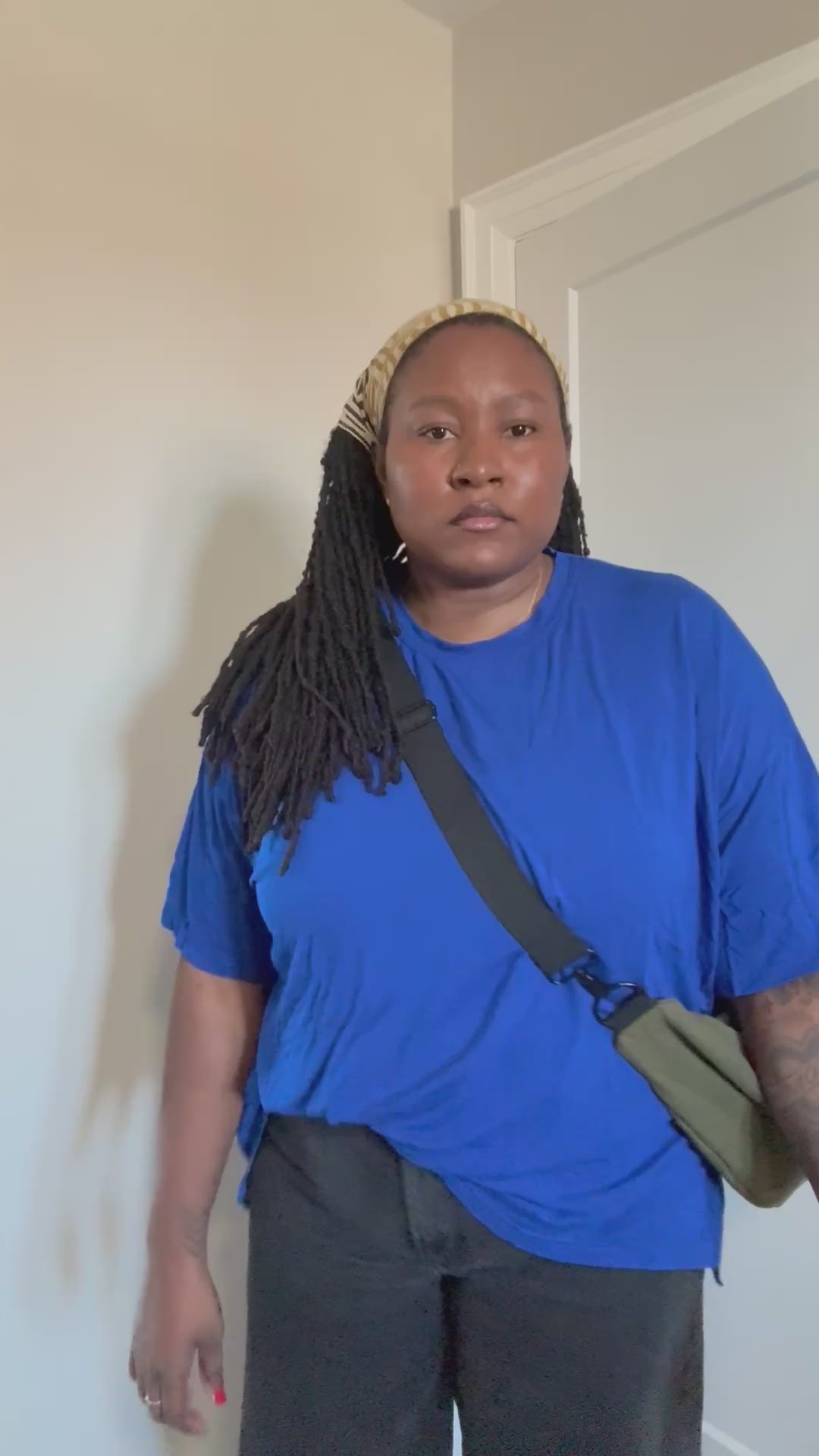 Black Woman wearing Green Linen Crescent Bag