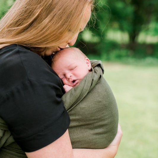 forest green newborn baby carrier